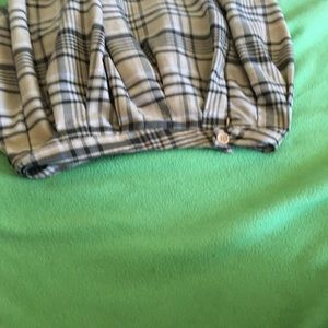 Two twin skirts  one black and tan other blue and black